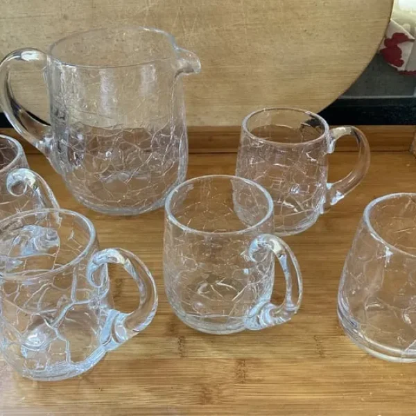 Crackle glass jug and 5 tankards