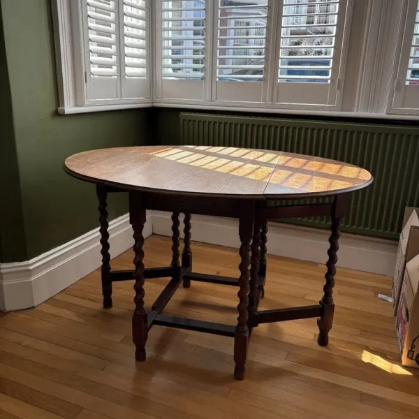 Drop leaf antique dining table
