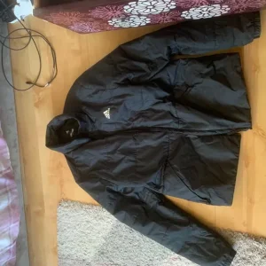 Attractive, well made Adidas, warm coat, medium