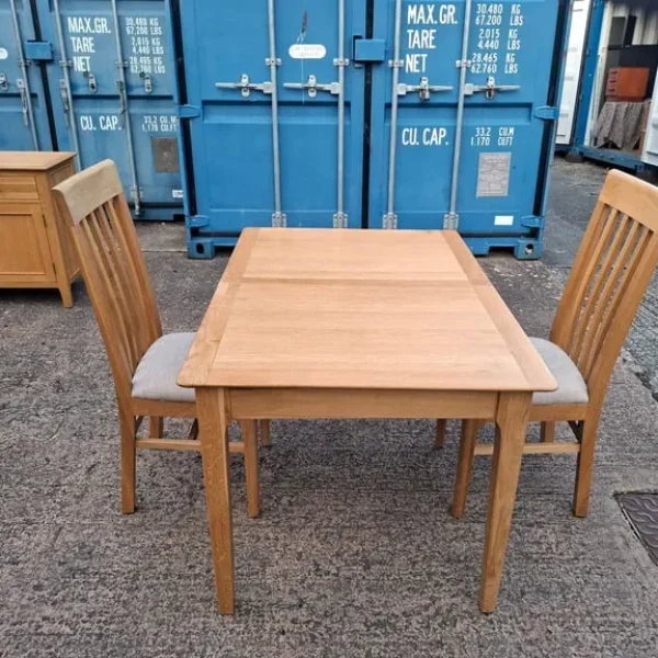 Oak extendable dining table and 2 chairs