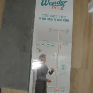 Stander security pole and curve grab bar