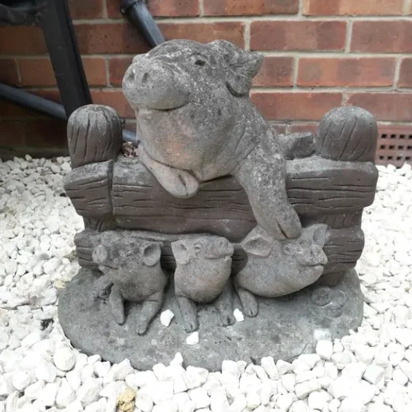 Pig family statue