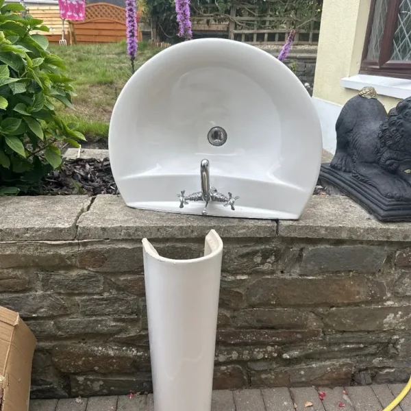 Bathroom basin and taps