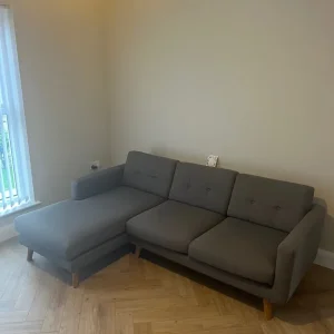 Grey fabric corner sofa