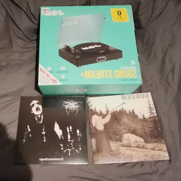 vinyl player plus 2 vinyl albums