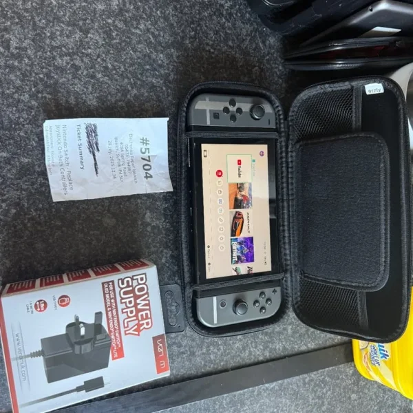 Nintendo Switch with new controllers and charger