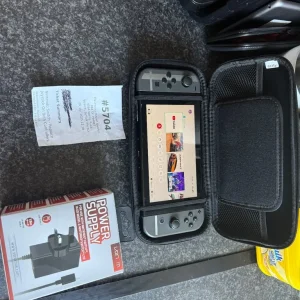 Nintendo Switch with new controllers and charger