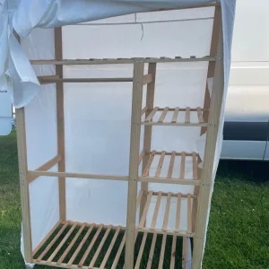 Wooden wardrobe with cotton cover