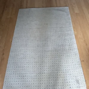 FREE John Lewis cream wool rug with blue dots
