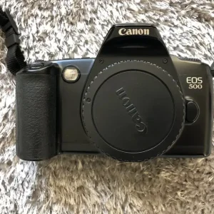 Canon EOS 500 with 2x lenses, filter, and tripod