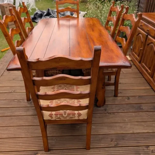 Solid wooden table with 6 chairs and sideboard