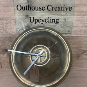 Daimler hub cap clock