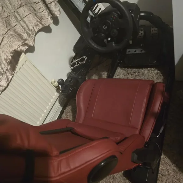 Driving simulator with steering wheel and pedals