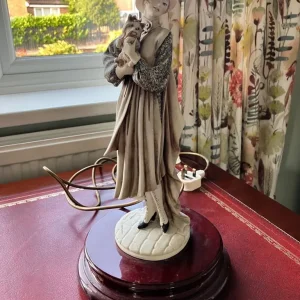 Table lamp with lady and terrier figurine