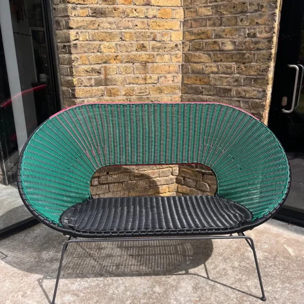 Garden bench in green black red