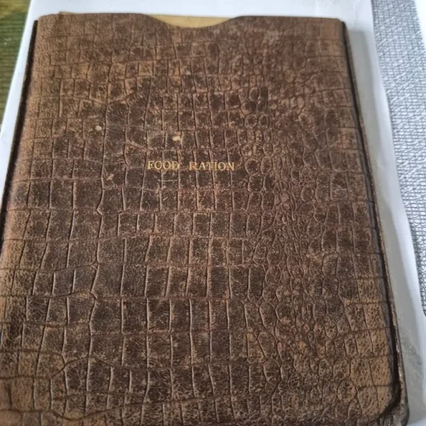 Ration books and leather holder