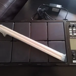 Roland Octapad SPD-30BK and drum sticks