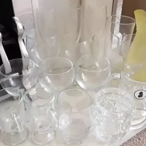 Assortment of Mixed Drinking Glasses and 1 Yellow Jug