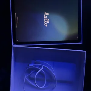 iPad (in box with pink case)