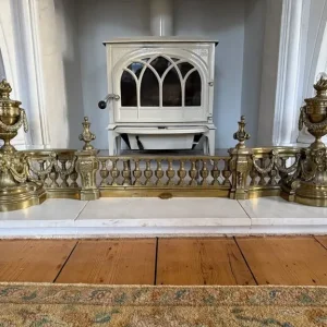Large brass fender urn finial swags & lion heads