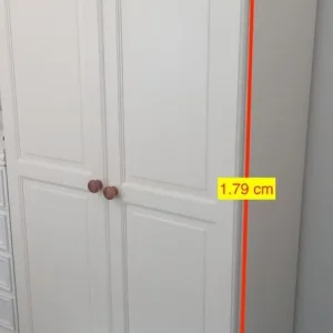 White wardrobe with hanging rail