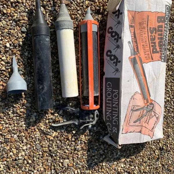 Pointing and grouting gun with assorted nozzles