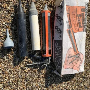Pointing and grouting gun with assorted nozzles
