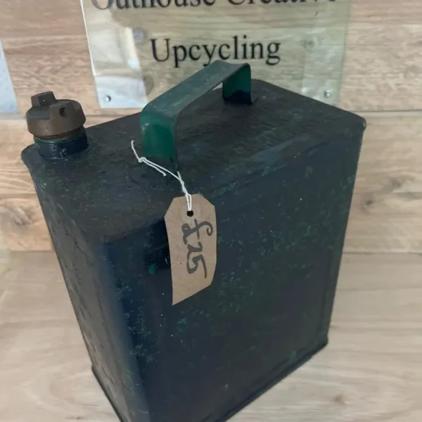 Vintage green petrol can with brass cap