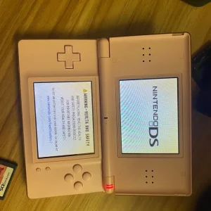 Nintendo DS Lite with games and new battery - Image 3