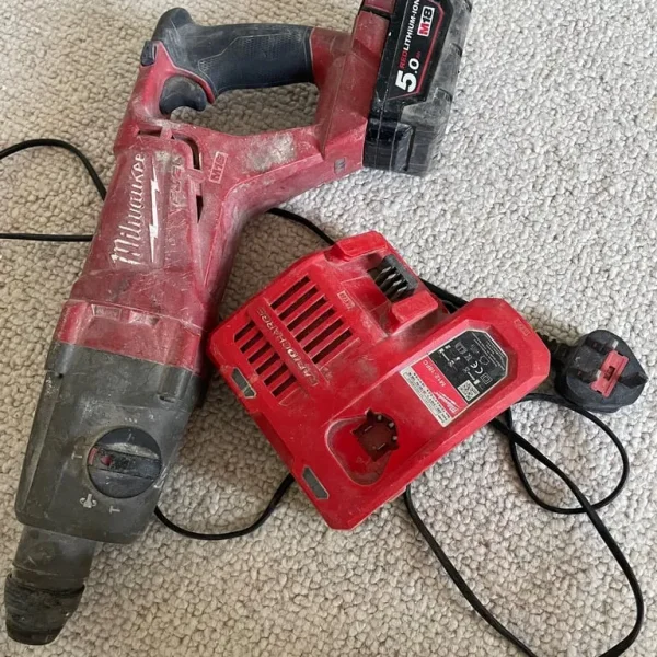 Milwaukee drill with 5-amp battery and charger