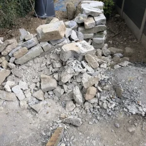 Broken concrete blocks and dust
