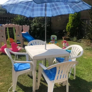 Table and 4 Chairs with Parasol and Seat Cushions