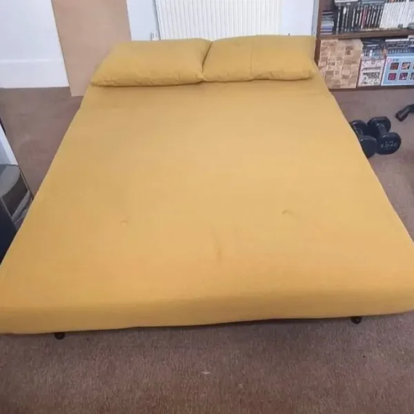 Made Haru small sofa bed in mustard yellow