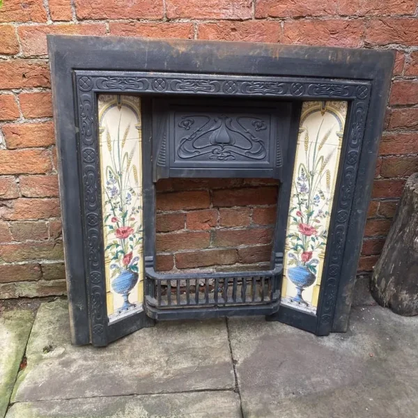 Antique cast iron fireplace surround